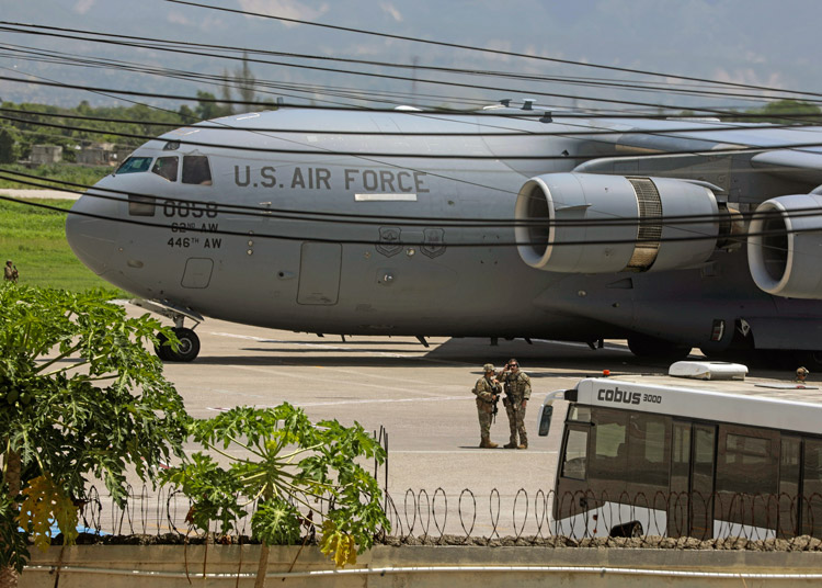 U.S. Air Force cargo plane arrives at Toussaint Louverture airport in Port-au-Prince, Haiti, May 11 to build operations base for Kenyan-led military force backed by Washington, U.N.