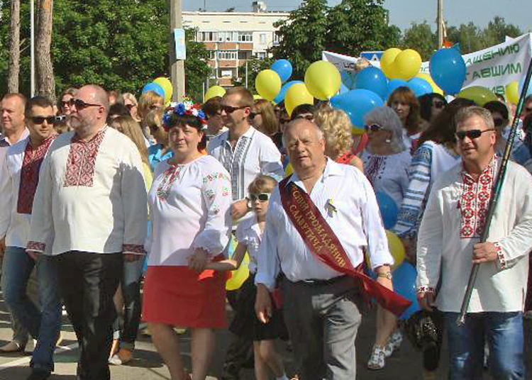 March in Slavutych, June 8, 2014, town founded to house nuclear workers, families displaced by 1986 Chernobyl disaster. Plant workers’ union, above, formed large contingent.