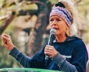 Kim Russell speaks at “We Won’t Back Down” rally in Phoenix, Arizona, Jan. 11, to protest male athletes who identify as women competing in women’s sporting events.