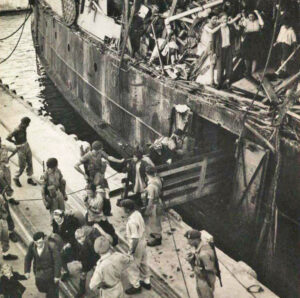 The Exodus, damaged by British attack on high seas, boarded, forced into port of Haifa, July 18, 1947.