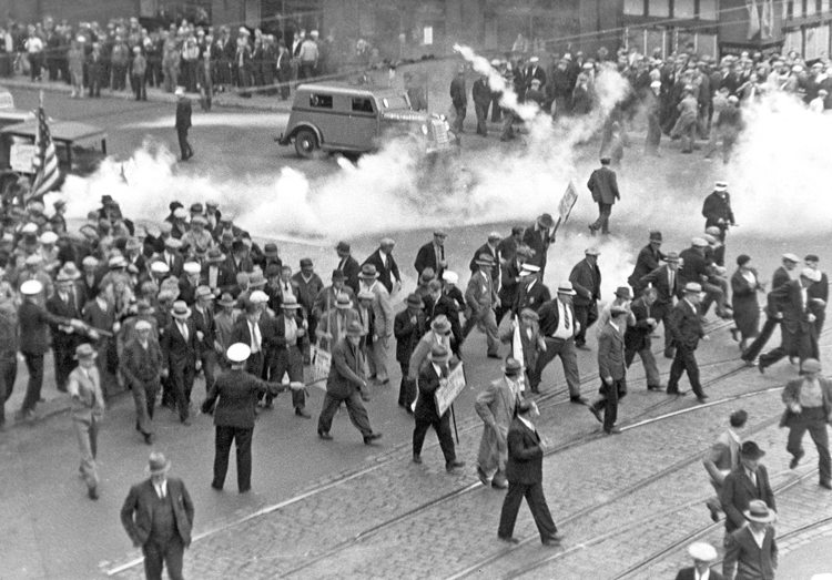 Minneapolis cops use tear gas against 10,000 unemployed workers protesting April 6, 1934. Teamsters strikes showed how to organize to win, electrifying broad masses of working people.