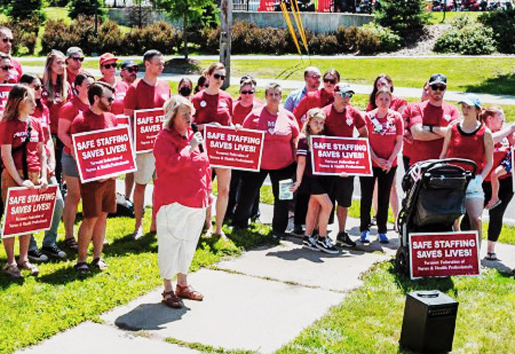 Deb Snell, head of nurses’ union at University of Vermont Medical Center, announces strike to take place July 12 at press conference in Burlington July 2. Socialist Workers Party campaigners petitioning there to put Rachele Fruit on the ballot are building support for the nurses’ fight.