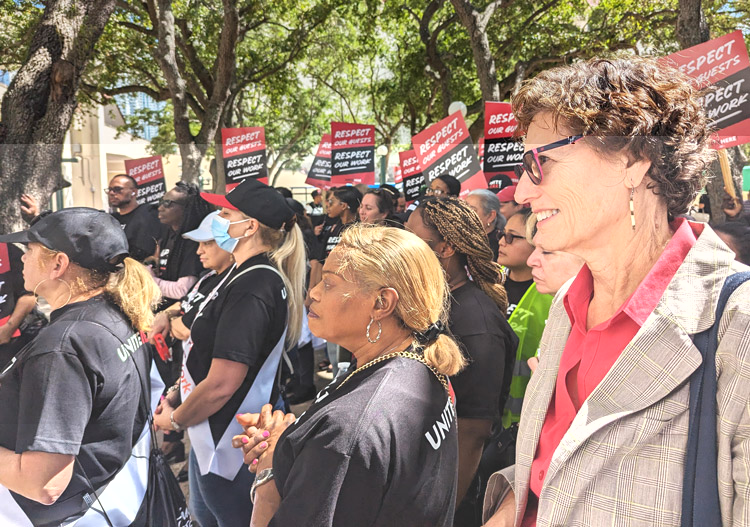 Rachele Fruit, right, SWP candidate for U.S. president, at UNITE HERE Local 355 rally May 1 in Miami. Fruit is a member of that local. The June 27 presidential debate “showed the political crisis of both capitalist parties,” Fruit told the Militant. “The world’s last empire is in decline.” 