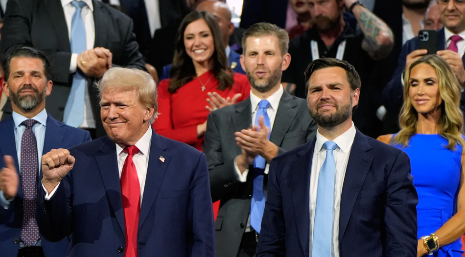 Presidential candidate Donald Trump with vice presidential running mate J.D. Vance at Republican National Convention, July 15. Trump’s two sons, Donald Jr., left, and Eric, with Eric’s wife Lara, are behind them. Trump united party to appeal to “forgotten” working people.
