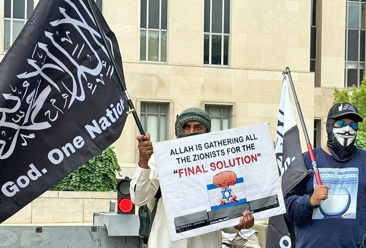 Sign held by Hamas supporter at Washington protest against Israeli Prime Minister Netanyahu speaking to Congress July 24, shows “anti-Zionism” is simply Jew-hatred in the Nazi tradition.