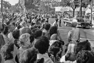 Mob rallies for segregated schools outside McDonogh 19 Elementary in New Orleans Nov. 14, 1960. Federal marshal’s car, right, carries Tessie Prevost, two other courageous Black girls.