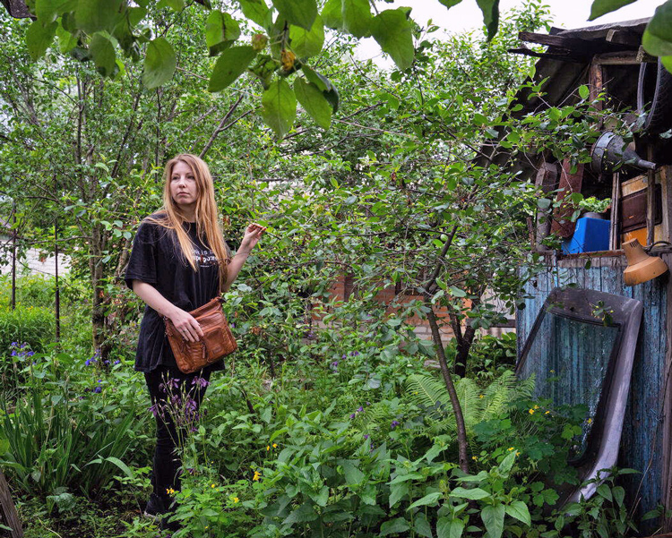 Author Victoria Amelina near tree where she dug up diary about Russian occupation by Volodymyr Vakulenko, a Ukrainian children’s book writer. He had buried it before being murdered. Amelina published it in 2023 before she was herself killed by a Russian airstrike.