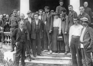 V.I. Lenin, front left, with delegates to Second Congress of Communist International, July 19, 1920. Under his leadership, Bolsheviks led Russian workers and peasants to power, setting worldwide example of kind of party, program and strategy needed for a socialist revolution.