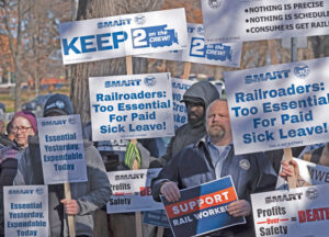 Rail union members protest in Washington, D.C., Dec. 13, 2022, after Biden, bipartisan Congress imposed rail contract and banned planned strike. “What’s needed is for workers to take political power into our own hands,” said Joanne Kuniansky, left, SWP 2024 candidate for Senate.