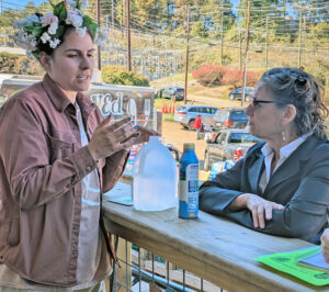 Rachele Fruit, right, SWP candidate for president, talks with Isabel Beteta at BeLoved Asheville aid center Oct. 18. She is one of hundreds of volunteers who came to aid hurricane victims in North Carolina.