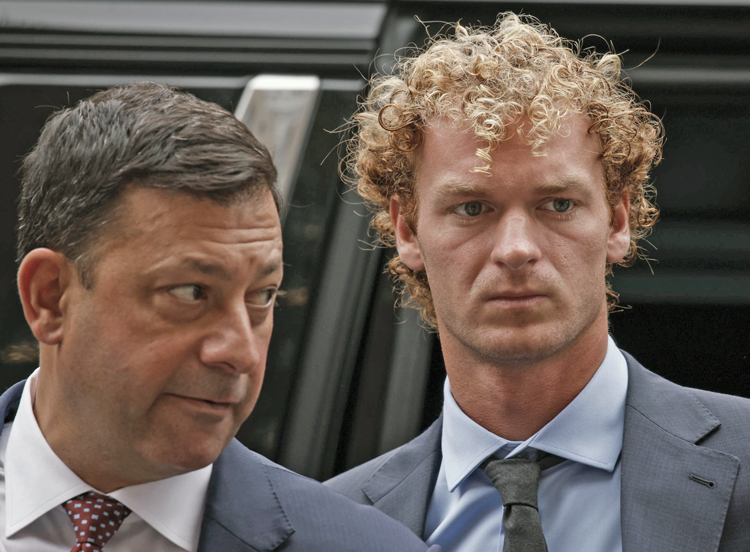 Daniel Penny, right, at New York courthouse Nov. 1. He faces manslaughter, other charges for restraining Jordan Neely, a homeless Black man, who threatened riders on subway he was on.