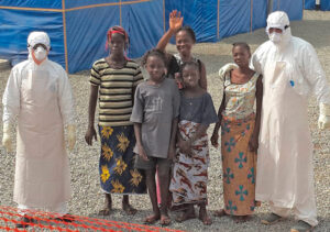 Cuban medical workers with recovered Ebola patients in Guinea in 2015. Within three days, 12,000 Cubans volunteered to join the hazardous international mission, Ubieta writes.