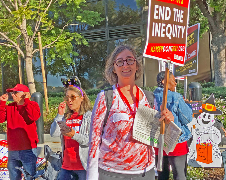 Lilian Honanian on picket line at Kaiser West Los Angeles Medical Center Oct. 31. Workers are striking for more hiring, pensions.