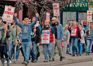 Boeing Machinists march after union rally in Seattle Oct. 15. Workers won a 38% wage increase. “The strike gave Boeing a taste of what we’re capable of,” one worker told the Militant.