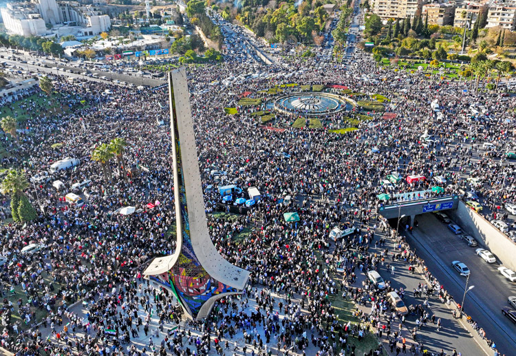 Damascus, Syria, Dec. 13. Millions celebrated across country over fall of Assad dictatorship. Mass graves holding tens of thousands of victims of regime’s torture are being uncovered.