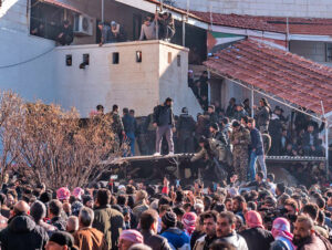 Syrians at infamous Sednaya prison near Damascus Dec. 9, hoping to find loved ones after rebels broke down doors to release thousands held in atrocious conditions by Assad dictatorship.