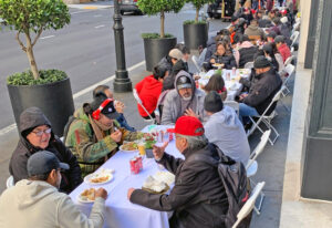 Pickets on strike at Palace Hotel in San Francisco celebrate Thanksgiving Day there Nov. 28.