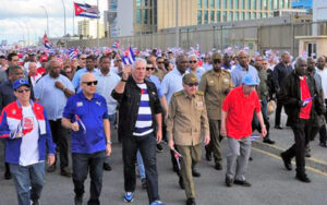 Cuban President Miguel Díaz-Canel and Cuban revolutionary leader Raúl Castro, center, lead 500,000 people along Havana’s Malecón Dec. 20 past U.S. Embassy to protest Washington’s decadeslong economic and political war against Cuba’s socialist revolution.