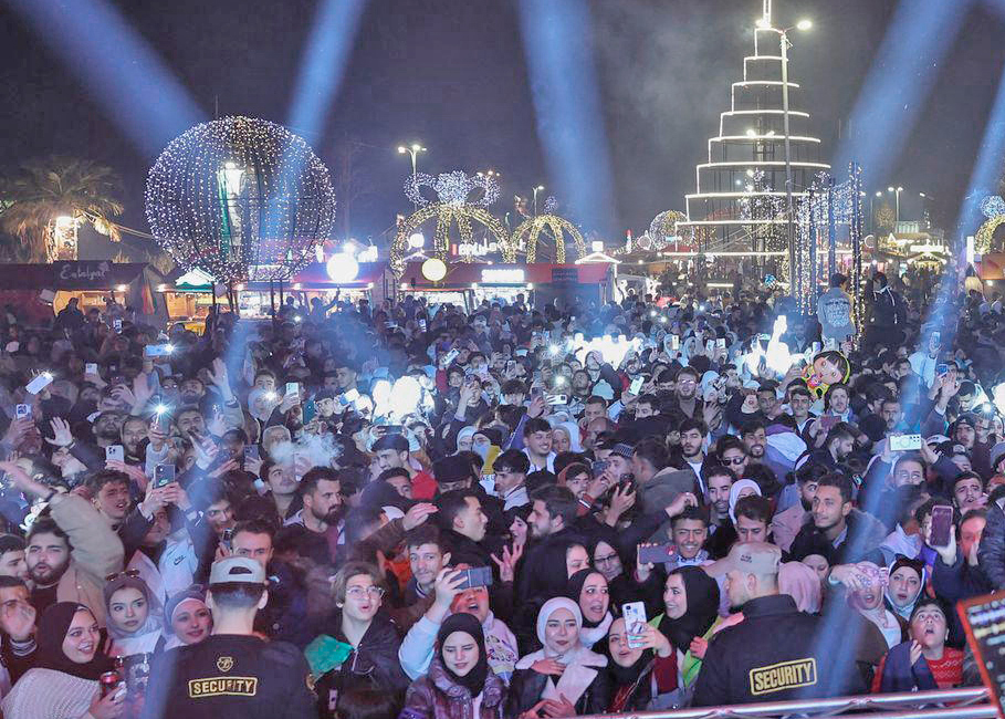 Huge crowd at New Year’s Eve celebration in Damascus, Syria, as millions across country marked fall of Assad family’s oppressive 50-year rule. Working people have high expectations as thousands were freed from Assad’s prisons and space has opened to fight for their interests.