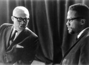 Malcolm X, right, and Clifton DeBerry at Militant Labor Forum in New York Jan. 7, 1965. DeBerry, chairing the meeting, was the Socialist Workers Party 1964 candidate for president.