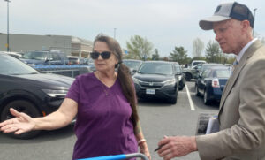 “It’s going to take us standing together,” Kim Kahoun, retired member of operating engineers union, told Craig Honts, SWP candidate for New Jersey lieutenant governor, outside Walmart in Hammonton April 19.