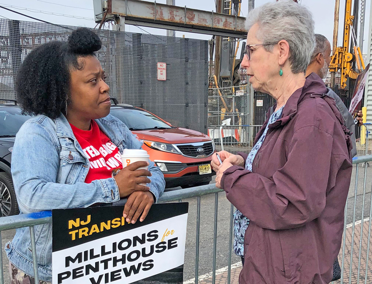 Joanne Kuniansky, right, Socialist Workers Party candidate for governor of New Jersey, brings solidarity to striking engineers picket line at New Jersey Transit station in Hoboken May 16.