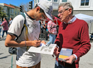 Eric Simpson, Socialist Workers Party candidate for mayor of Oakland, campaigning April 12 at Cesar Chavez festival in San Francisco. SWP campaigns are drawing more support in 2025.