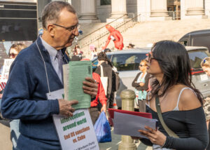 Paul Mailhot, left, SWP candidate for mayor of New York, at May Day rally. Socialist Workers Party calls for working people to break with the Democrats, Republicans, take political power.