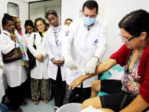 Cuban doctors train at health clinic in Brasilia, Brazil, in 2013, part of the Mais Medicos program there. Doctors, nurses from Cuba have treated millions in municipalities across Brazil.