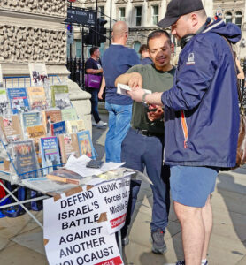 Communist League table at Sept. 7 antisemitism march.