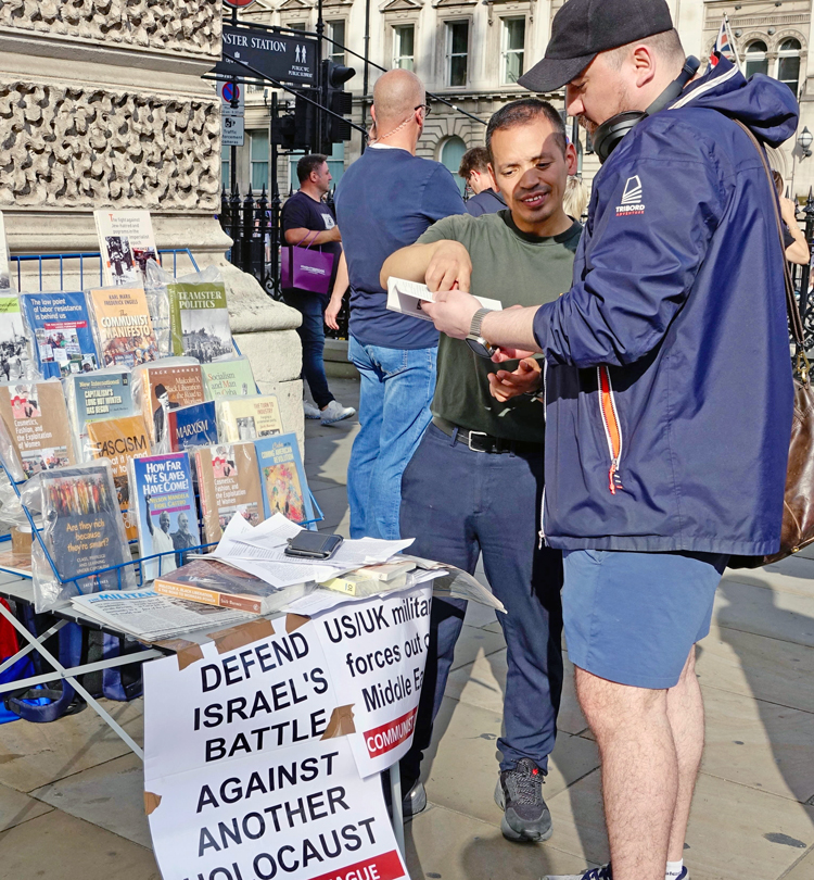 Communist League table at Sept. 7 antisemitism march.