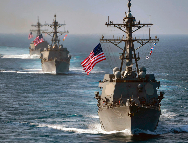 Guided-missile warships, like destroyers in Arab-Persian Gulf in 2018, are being deployed off Venezuela as Washington threatens to topple government under guise of fighting drug cartels.
