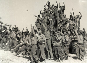Militia members cheer when Cuba’s working people, revolutionary armed forces under Fidel Castro’s leadership, defeat U.S.-backed mercenary invasion at the Bay of Pigs, April 1961.
