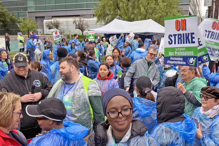 Nurses and other health care workers picket Kaiser hospital in Los Angeles Oct. 14, first day of strike at 500 facilities in California and Hawaii, fighting for wage raise and hiring more workers.