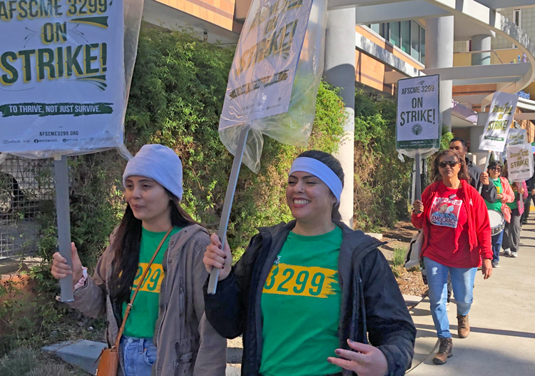 Members of AFSCME Local 3299 picket UCSF Benioff Children’s Hospital in Oakland Nov. 18, part of statewide two-day strike at UC hospitals for higher pay and better working conditions.