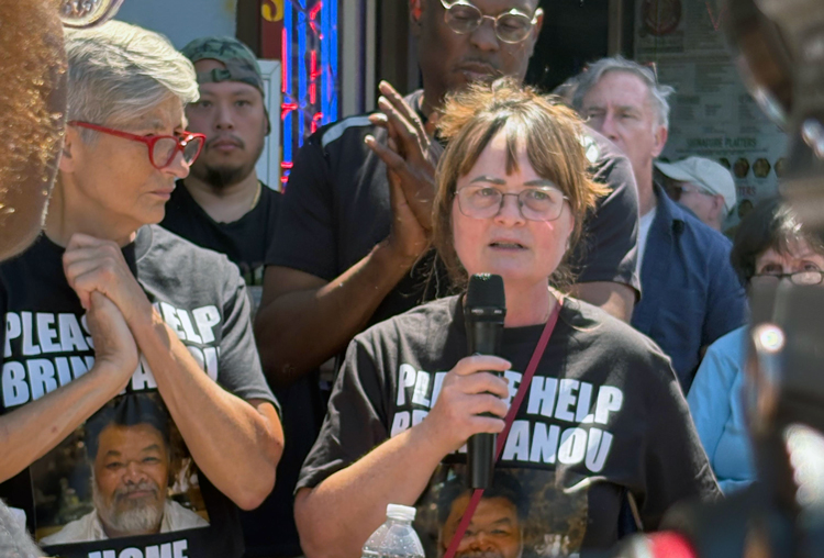 Hundreds protested Aug. 9 against ICE arrest of Anou Vongbandith in Philadelphia. “This is not just about Anou, but every family torn apart like ours,” his wife Ahn tells rally, above.