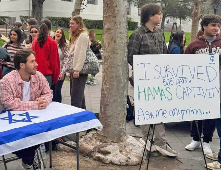 In addition to speaking in a packed auditorium at UC Berkeley, former hostage Omer Shem Tov staffed a table on campus, inviting those who’ve heard pro-Hamas lies to come talk to him.