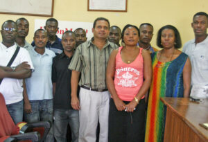 Guinean medical students about to leave for Cuba for their final year of medical studies in 2005. In striped shirt, Leonardo Ramírez, leader of Cuba’s medical volunteers in Equatorial Guinea. Second from right, Ana Morales, first secretary of Cuban Embassy, and also a doctor.