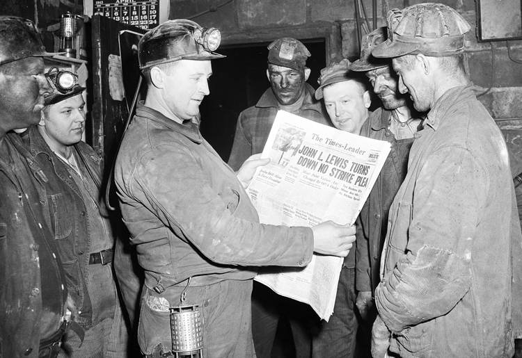 Miners in Ohio read about the UMWA battle May 1, 1943. In midst of imperialist war, miners defied government order to go back to work, continued their strike, won broad labor support.