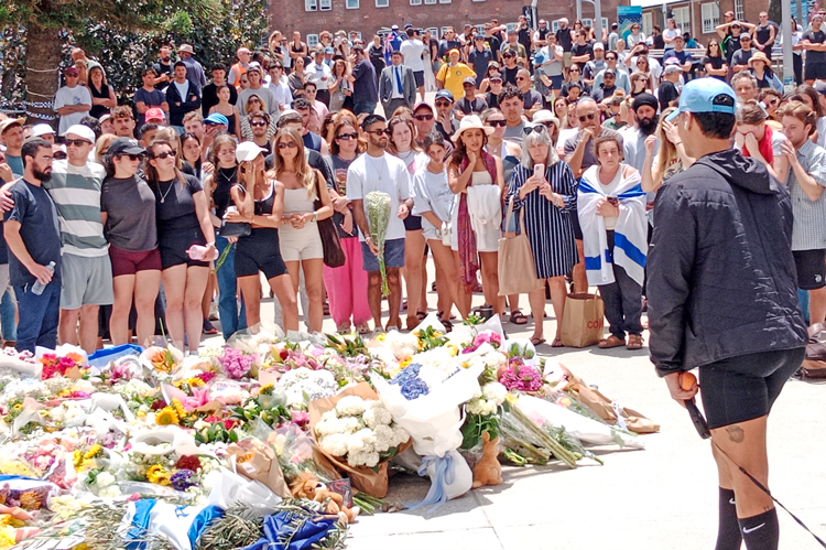 Large crowd at Bondi Beach Pavilion in Sydney Dec. 15 pays tribute to victims of pogrom the day 
before. Killings lend urgency to the need to fight Jew-hatred, defend Israel as a refuge for Jews.