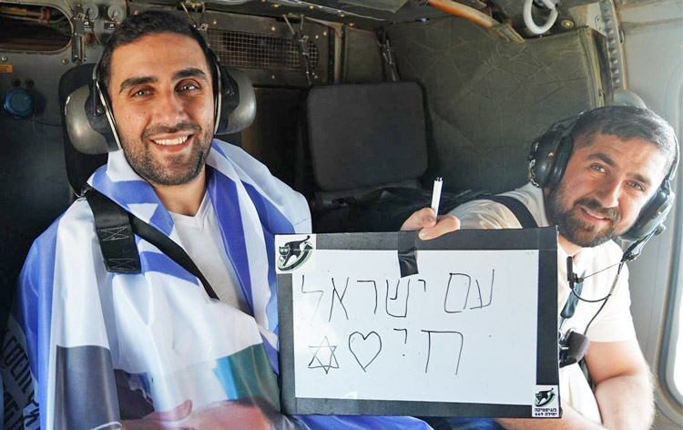 Segev Kalfon, left, in helicopter Oct. 14, free after 738 days as hostage. Like other Israeli prisoners of Hamas, he speaks out about physical, sexual and mental torture inflicted on him.