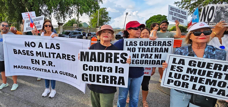 Demonstration against U.S. Marines training at Camp Santiago in Salinas, Puerto Rico, organized by Mothers Against War Nov. 29. In center is Sonia Santiago, a leader of the group.