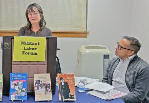 Anh Vongbandith speaks at Jan. 10 forum in Philadelphia on fight by her husband Anou and Kilmar Ábrego García against threats of deportation. At right is SWP member Ved Dookhun.