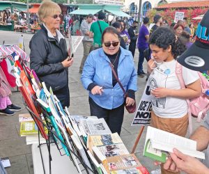 Laura Garza, SWP candidate for mayor of Los Angeles, center, discusses importance of fight for amnesty for all immigrants in the U.S. to unite the working class at Jan. 23 rally in Los Angeles.