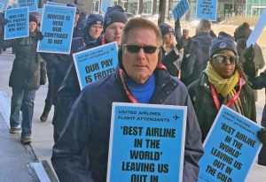 Over 200 United Airlines flight attendants and their supporters picketed at United’s corporate headquarters in Chicago Jan. 15, part of their four-year-long battle for a new contract.