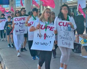 Some 10,000 flight attendants, members of Canadian Union of Public Employees, above in Toronto, struck Air Canada in August 2025, defied federal gov’t back-to-work order.