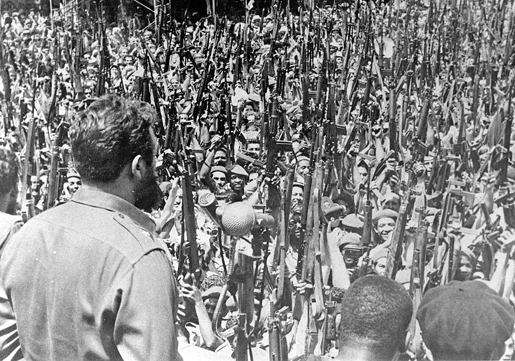 Fidel Castro prepares workers and peasants to defend their socialist revolution against 1961 U.S.-backed mercenary invasion at the Bay of Pigs. Under his leadership, they prevailed.