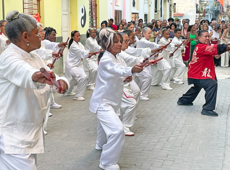 Celebration of Lunar New Year in Havana’s Chinatown, Feb. 15. On right is Roberto Vargas, director of Cuban Wushu (Martial Arts) School. He said such joint Chinese and Cuban culture is important for the future of “humanity, for peace and solidarity.” 