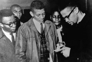 Malcolm X spoke to thousands at Tuskegee Institute in Alabama Feb. 3, 1965. Then SNCC Black rights fighters took the revolutionary leader to speak in Selma, where a sharp battle was raging.