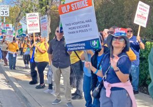 Striking nurses, other health care workers picket West Los Angeles Kaiser hospital Feb. 9. Some 31,000 hospital workers in California, Hawaii are fighting for more staffing to care for patients.